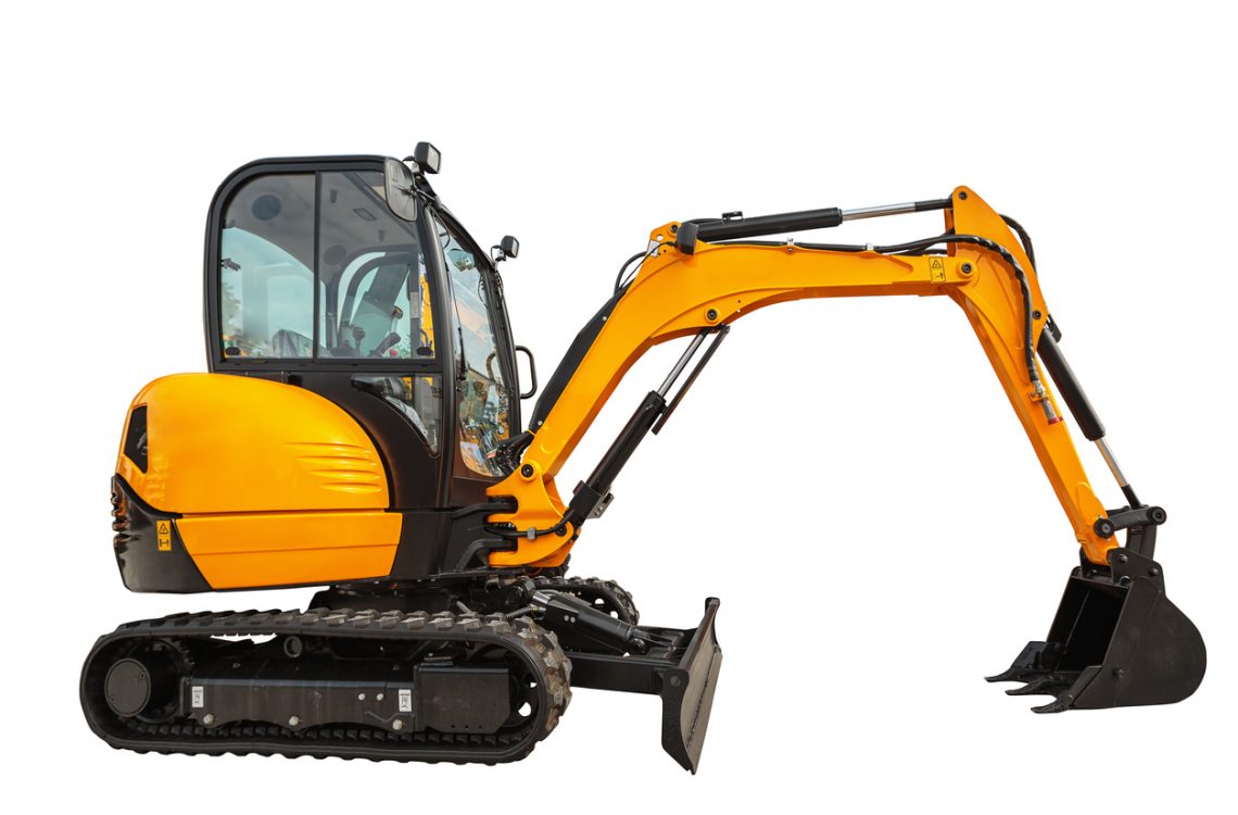 Small or mini excavator with clipping path isolated on white background